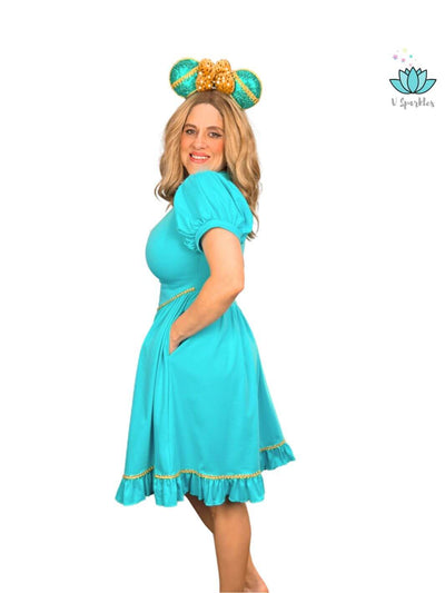 Arabian Princess Self-Treat Dress: Treat yourself to the magic of the Arabian nights with this Jasmine-inspired adult dress, perfect for fashion-forward fans of the princess.