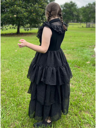 Model wearing Wednesday Addams dress showing the side