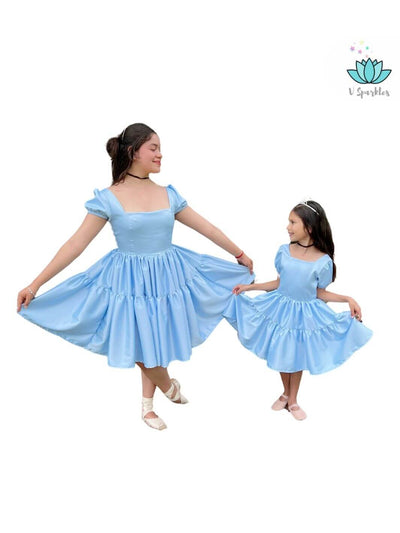 Base Blue Twirl Dress for Adults – Ideal for Winter Disneybounding – This beautiful Cinderella-inspired blue base twirl dress is perfect for creating an elegant Disneybounding look for winter holidays, parties, or themed celebrations. Available in mid-size and plus-size options.