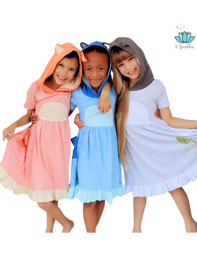 "Bingo-inspired kids' dress featuring playful dog-themed pockets, ideal for Disneybounding, Halloween, or as a birthday dress. Great for dress up games and pretend play.