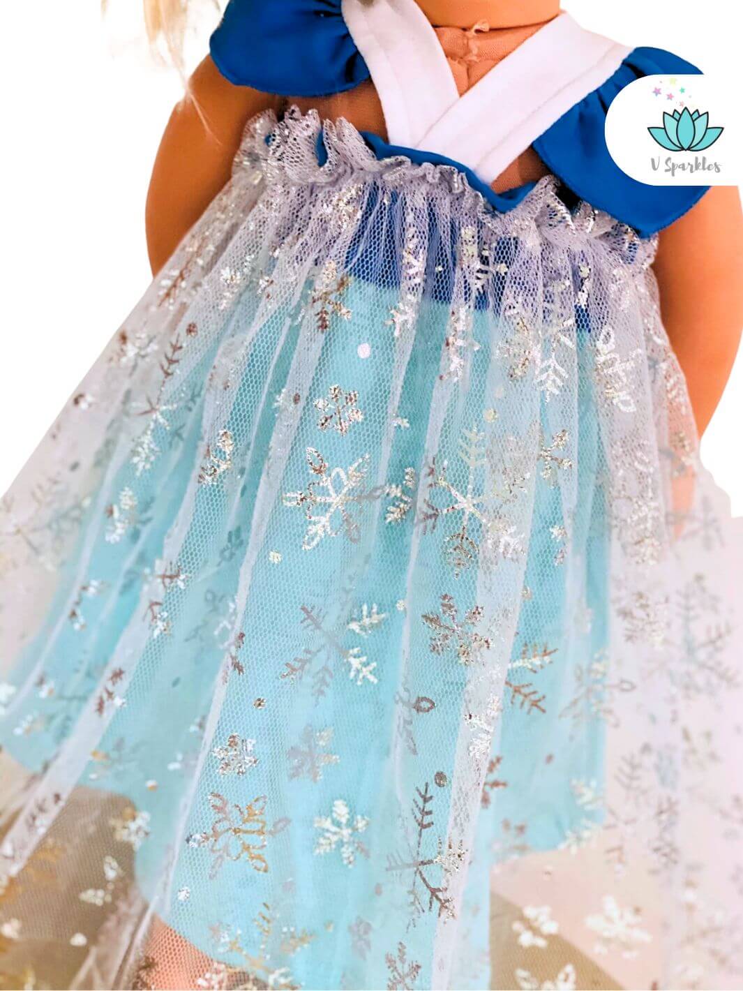 "Charming Elsa doll dress with icy details, designed for dress-up games and Disneybounding. Ideal for a winter-themed Halloween costume, birthday dress, or as a magical gift.