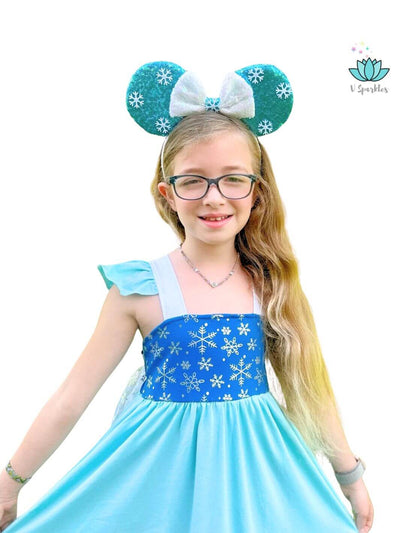 Frozen Elsa Princess Dress for Disneybounding and Special Events: A stylish Elsa-inspired dress for kids, featuring a detailed snowflake cape, perfect for Disneybounding, Halloween, or birthday celebrations. Great for play pretend and dress-up games.