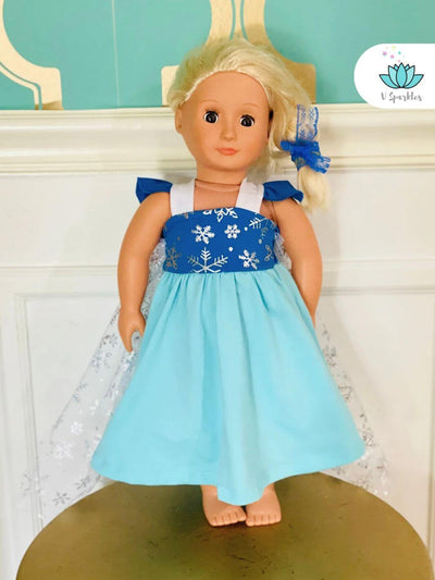 "Disneybound Elsa doll outfit featuring a snowflake-printed bodice and ice-blue skirt, ideal for play pretend, Halloween costumes, or birthday celebrations. A great self-treat or gift.