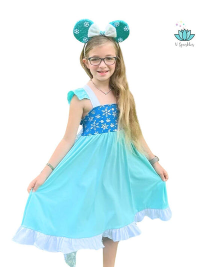 Elsa Frozen Dress with Snowflake Cape for Kids' Dress-Up Games: A lovely Elsa-inspired dress featuring a detailed snowflake cape, ideal for Disneybounding, Halloween, and birthday events. Perfect for imaginative play pretend and dress-up fun.