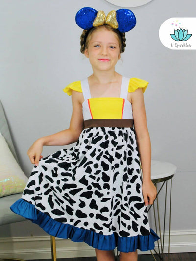 "Adorable Jessie-themed kids' dress, featuring cow print and playful design, perfect for dress-up games, Disneybound adventures, or a unique birthday outfit.