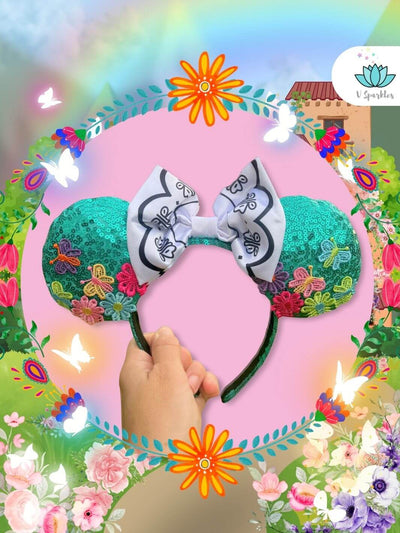 "Mirabel-inspired ear headband with embroidered flowers and butterfly bow, perfect for Disneybound, Disneybounding outfit, or a fun Halloween costume. Great for a birthday dress to impress or play pretend game.