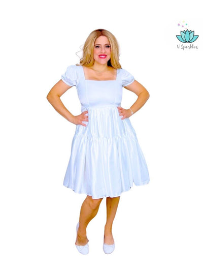 Base White Twirl Dress for Adults – Complete Elsa Transformation – Channel your inner Elsa with this stunning white base twirl dress. Perfect for Disneybounding, Halloween parties, or holiday celebrations. Available in mid-size and plus-size options.