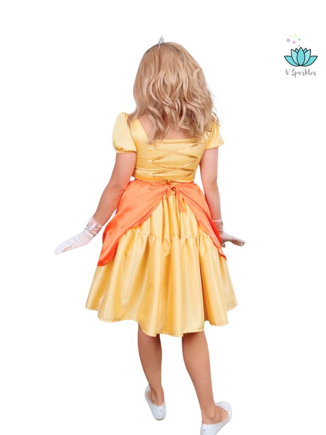 Yellow Princess Video Game Dress-Up Overskirt for Adults – Easy Princess Peach Costume Transformation – This yellow princess dress-up overskirt offers an easy and magical transformation into Princess Peach for adults attending Halloween or Disneybounding events. Available in mid-size and plus-size options.