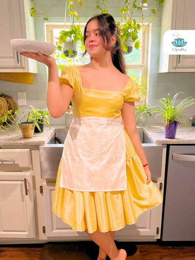 Lily Pad Princess Waitress Dress-Up Overskirt for Adults – Ideal for Special Events and Disneybounding – This waitress-inspired overskirt adds a Princess Tiana touch to any outfit, ideal for Disneybounding, Halloween, or holiday celebrations. Available in mid-size and plus-size options.