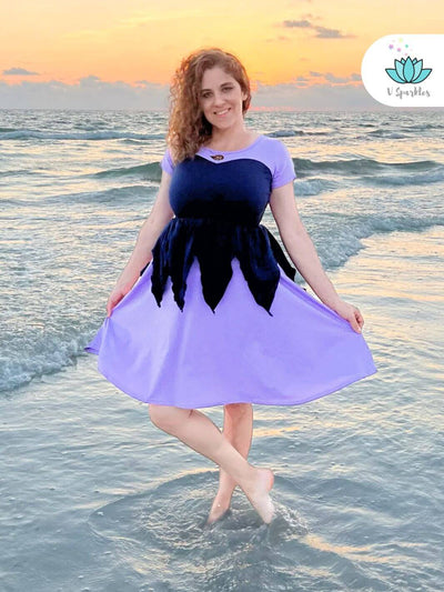 Ursula Sea Witch Halloween Costume: Transform into the iconic sea witch with this Ursula-inspired Halloween costume, ideal for adults who love to dress to impress and have fun with fashion.