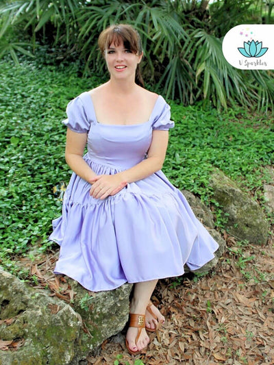 Base Purple Twirl Dress for Women – Easy Rapunzel Costume Transformation – This base purple twirl dress offers an easy transformation into Rapunzel for adults. Ideal for Disneybounding, Halloween costumes, or holiday celebrations. Available in mid-size and plus-size options.