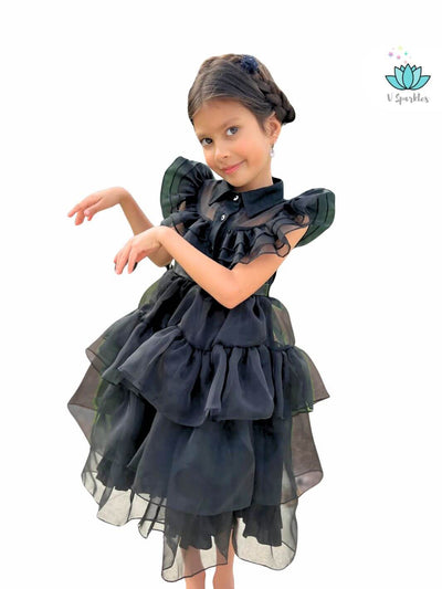 Disneybound as Wednesday Addams with this black ruffled kids' dress, perfect for Halloween, birthday dress-ups, and dress-to-impress moments.