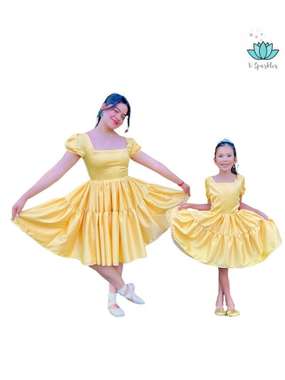 Base Yellow Twirl Dress for Women – Easy Princess Tiana Costume Transformation – This yellow base twirl dress offers an easy and magical transformation into Princess Tiana for adults. Ideal for Disneybounding, Halloween costumes, or holiday events. Available in mid-size and plus-size options.