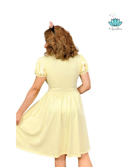 Disneybounding Fashion for Adults – Belle-Inspired Dress: Capture the essence of Belle with this Disneybounding outfit, combining a flattering fit with playful design for adults who love dressing up and celebrating Disney magic.